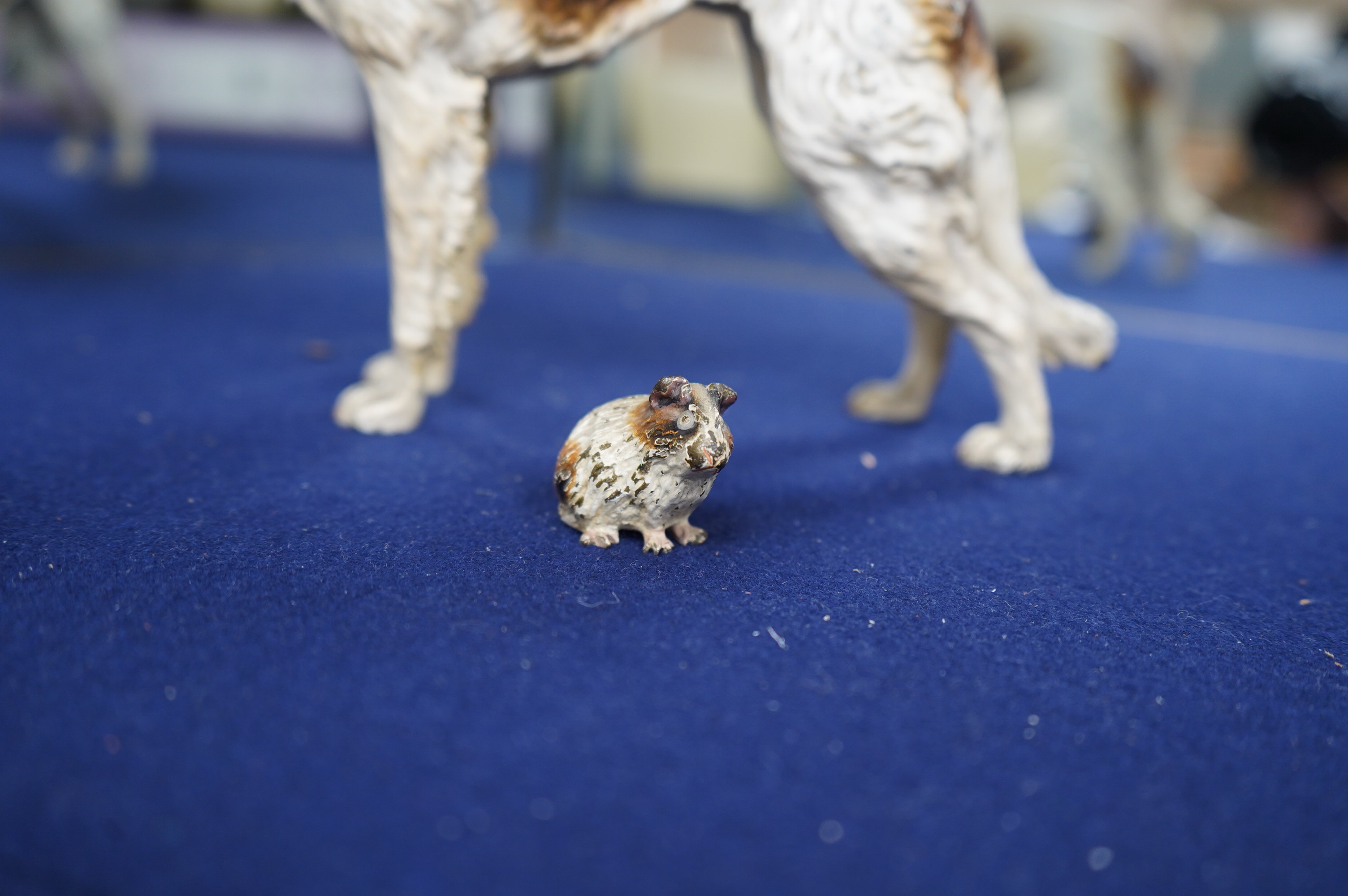 An Austrian cold painted bronze model of a borzoi, 24cm and a guinea pig, 4cm. Condition fair to good, minor chipping to paintwork.